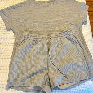 Boutique set.  Textured short sleeve shirt and shorts set.